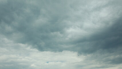 Fototapeta premium A Dramatic Cloudy Sky Displaying Various Shades of Grey and Unsettled Atmosphere