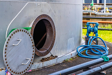 Manhole fuel tank oil chemical protective clothing area confined space