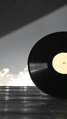 Obraz premium A vinyl record on a wooden surface