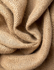Close Up of Brown Burlap Fabric Showing Rough Texture in Natural Light