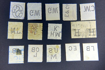 Exploring Perfins in Stamp Collecting: Intricate Designs and Their Historical Significance