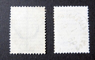 Obraz premium Exploring the Intricate World of Philately Through the Reverse Side of Historic Postage Stamps