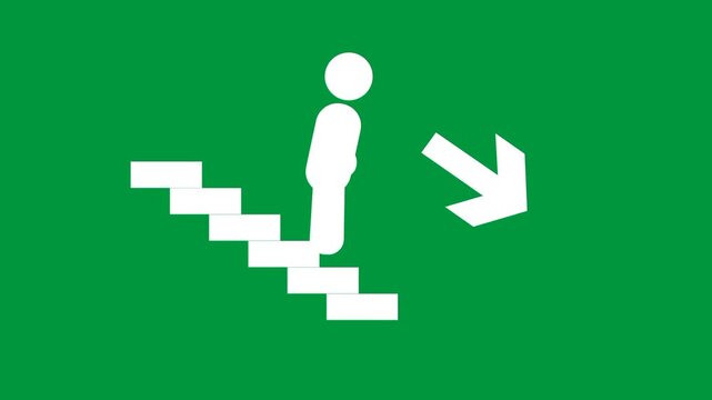 A green emergency sign showing a person walking downstairs to indicate a safe evacuation route towards lower levels during emergencies