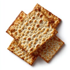 Fototapeta premium Three crisp, unleavened crackers, lightly browned, stacked, showing textured surface and edges