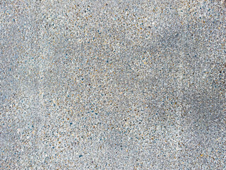 High resolution concrete wall texture background with aggregate and sand mix, seamless design pattern in 8k resolution