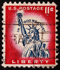 UNITED STATES OF AMERICA - CIRCA 1961.postage stamp printed in USA shows a picture of Statue of Liberty in a close-up containing the motto: "in god we trust", circa 1961