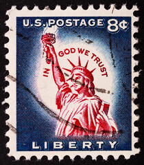 UNITED STATES OF AMERICA - CIRCA 1958.A Stamp printed in USA shows the Statue of Liberty, with the inscription "In God we trust", circa 1958