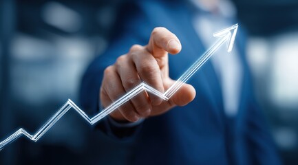 Businessperson pointing at a rising graph