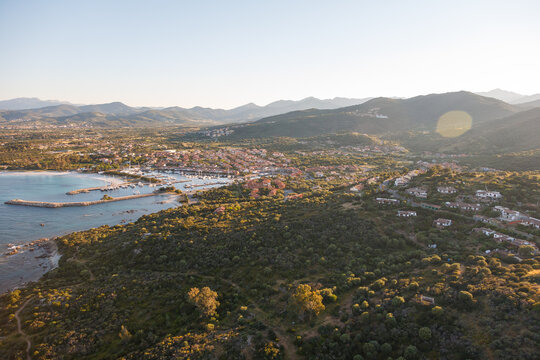 aerial view of tourist landmark spot porto ottiolu san teodoro sardinia with harbour and promenade
