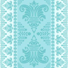 A seamless vector pattern featuring an elegant and symmetrical damask design. This ornate pattern combines detailed floral and geometric elements in a beautiful light blue color palette.