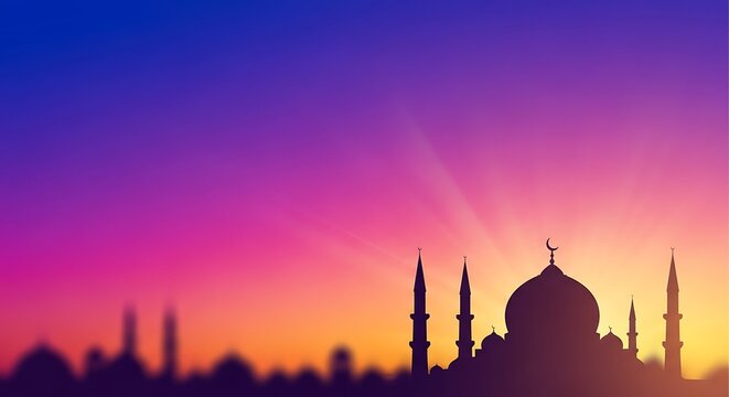 Silhouette of a mosque against a colorful sunset sky, evoking a sense of peace and spirituality.