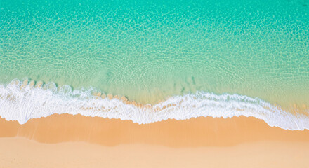 Serene Beachfront: An aerial perspective unveils the exquisite meeting of turquoise ocean waves with golden sandy beach, creating a stunning, minimalist display of natural beauty. 