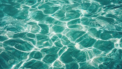 Obraz premium Teal water surface with sun reflections