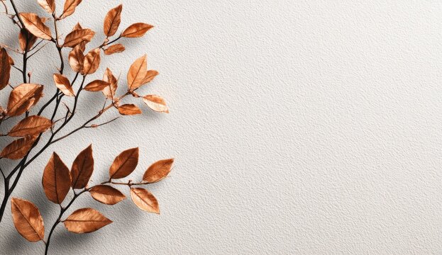 Autumn leaves on light beige background