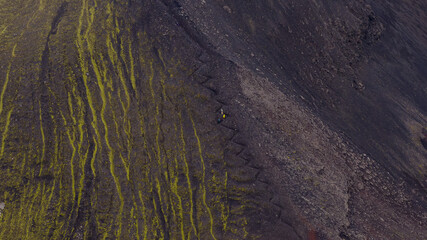 Volcanic Slope in Iceland with Rugged Terrain and Green Vegetation
