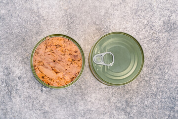 Canned tuna in brine isolated on vintage background	