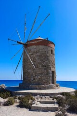 Rhodes windmills. Beautiful concept for travel and vacation in Greece.
