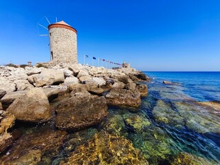 Rhodes windmills. Beautiful concept for travel and vacation in Greece.