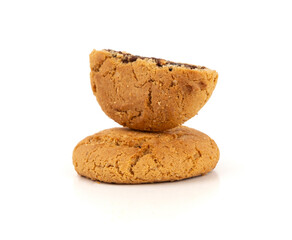 Chocolate cookies with chocolate filling isolated, brown round biscuits, broken sweet cocoa pastry