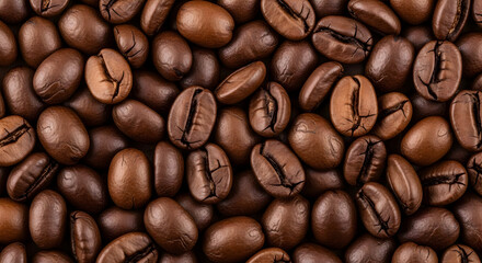 Obraz premium Roasted coffee bean background showcasing rich textures and natural patterns for advertising