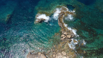 Top aerial view of Mediterranean coastline near by Peyia on sunny summer day. Cyprus.