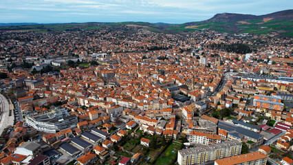 An aerial panoramic view around the old town of the city Millau in France on a sunny day in early spring