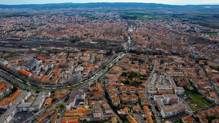 An aerial panoramic view around the old town of the city Narbonne in France on a sunny day in early spring
