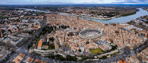 n aerial panoramic view around the old town of the city Arles in France on a sunny day in early spring