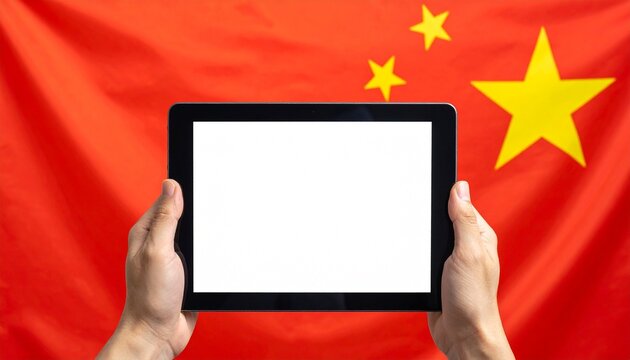 Hands holding tablet with blank screen in front of Chinese flag—symbolizing tech presence and national identity.