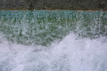 Image of waves with white foam.