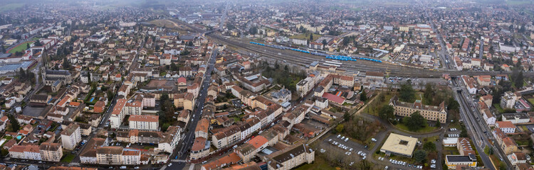 An aerial panoramic view around the old town of the city Bourg-en-Bresse in France on a sunny day in early spring