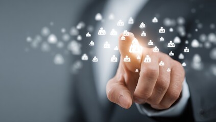 Businessman interacting with digital icons of people