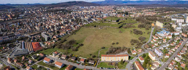 An aerial panoramic view around the old town of the city Belfort in France on a sunny day in early spring