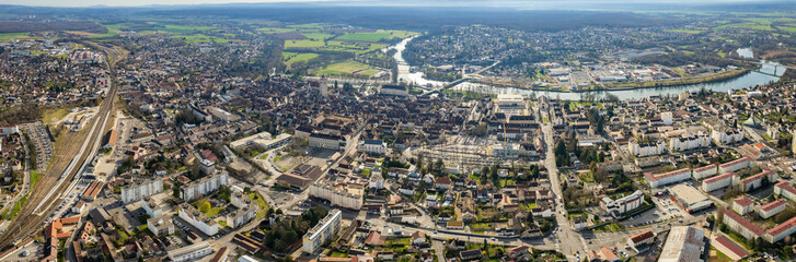 An aerial panoramic view around the old town of the city Dole in France on a sunny day in early spring