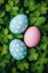 Festively painted easter eggs nestled among vibrant green clover leaves, perfect for spring celebrations and seasonal decor inspirations