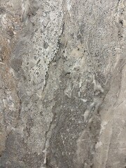 Gray marble tile texture background. Natural stone surface with elegant veining. Perfect for interior design, architecture, and decor projects.