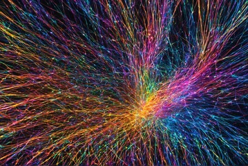 Exploding rainbow fiber optic strands with glowing light in futuristic technology background