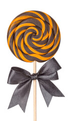 Swirling Lollipop with Ribbon: A mesmerizing, colorful lollipop with a spiral design rests elegantly, accentuated by a decorative ribbon. Capturing sweetness.