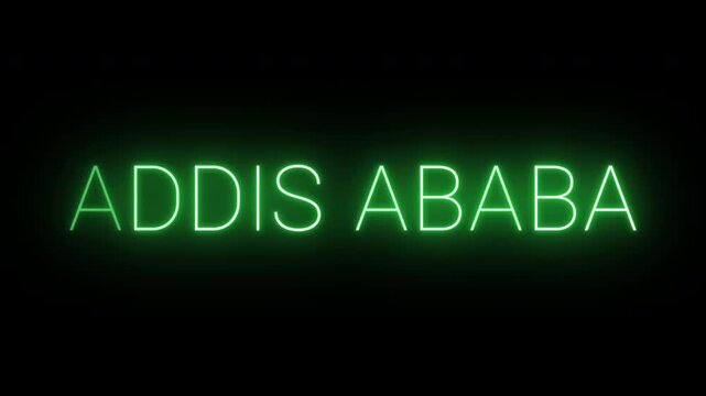 Flickering neon green Addis Ababa sign animated on black background.
