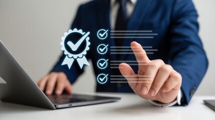 Businessman using laptop for quality assurance management system