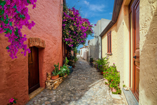 Charming street in Posada historical center, Sardinia, Italy