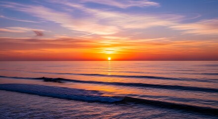 Vibrant Sunset Over Calm Ocean Waves.