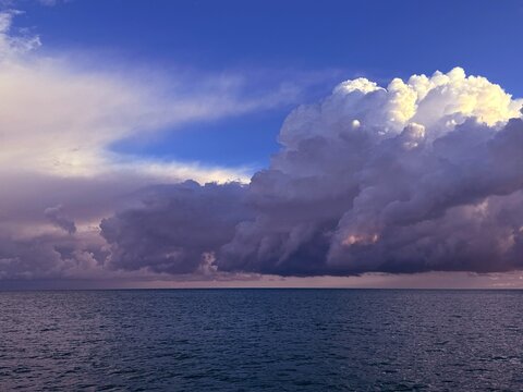 Thunderclouds storm clouds over ocean. 