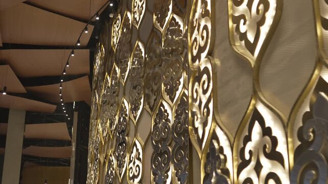 Metal transformed into delicate curves enriches luxurious interior. Ornament radiates pride artistry and timeless cultural values
