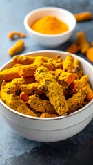 Turmeric roots in a bowl