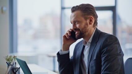 Corporate colleagues talking phones at desk closeup. Man woman smartphone calls