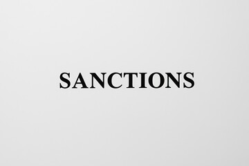 Sanctions Concept Text on White Background