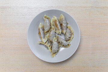 A plate of freshly cooked dumplings.