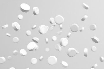 Falling Pills isolated on white background, selective focus