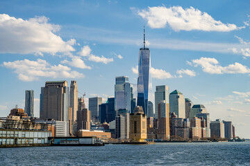 Obraz premium Office buildings and hotels in the city skyline. Panorama view of New York city.